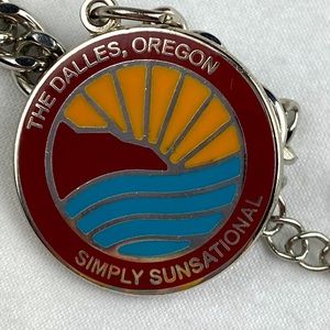 The Dallas, Oregon silver tone charm bracelet